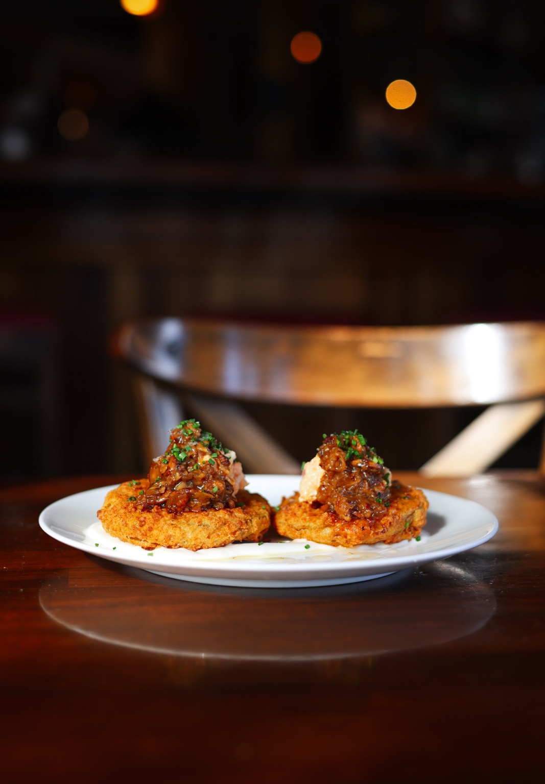 Two plated appetizers at Henry’s